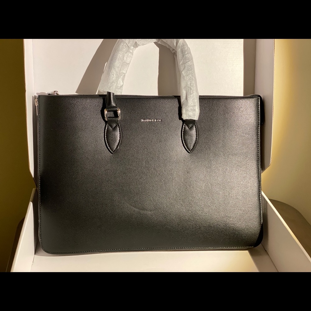 Limitless voyage briefcase. Brand new